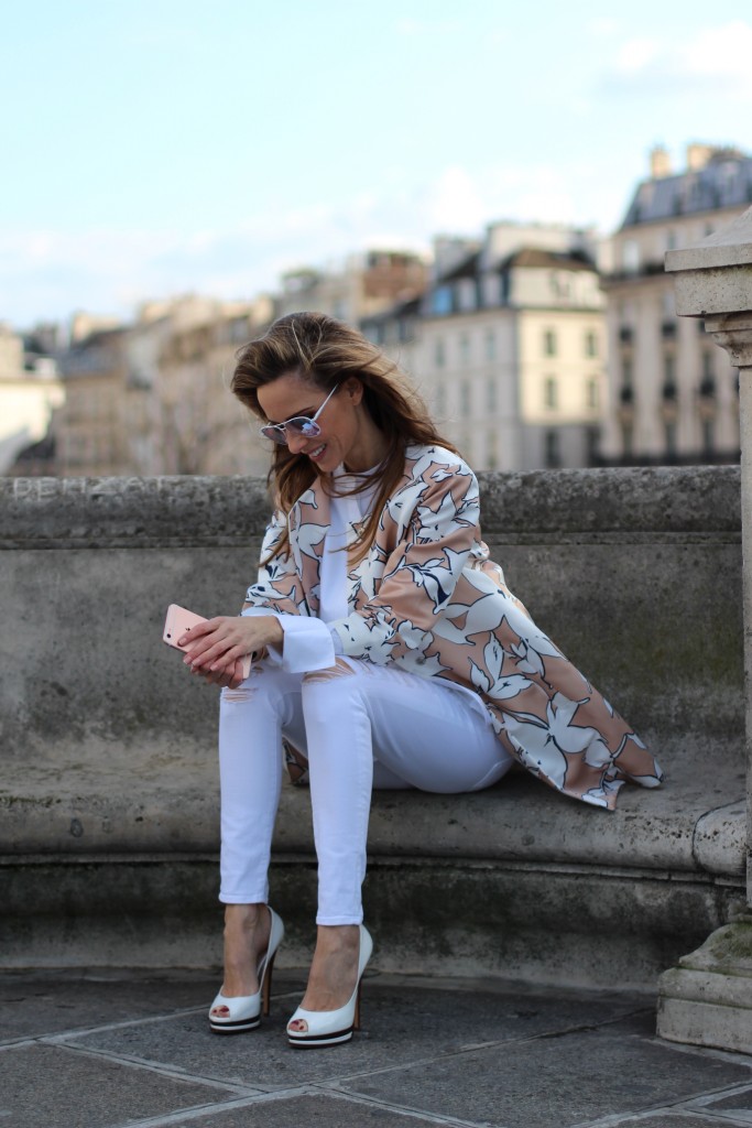 Alexandra Lapp wearing a floral coat from Herzensangelegenheit, Frame, Celine, Casadei, Cutler-and-Cross