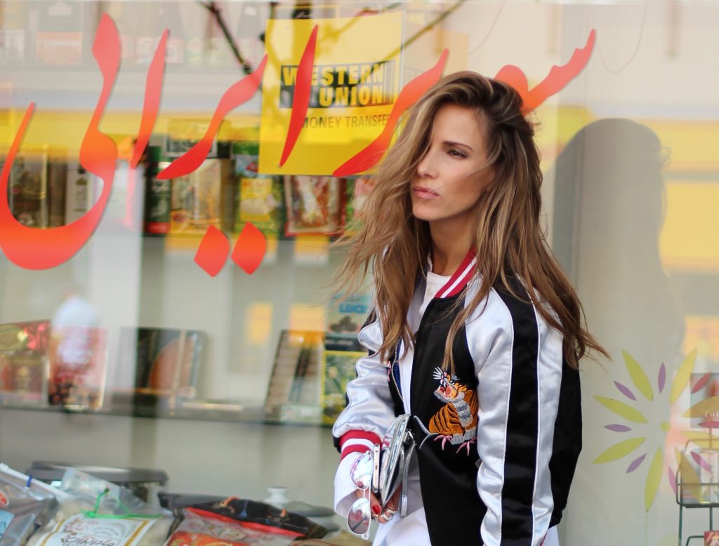 Topshop, Miu Miu, Louis Vuitton, Cutler and Cross, Celine, Levi's, Bernard Delettrez Alexandra Lapp wearing a bomber jacket from Topshop, Miu Miu, Louis Vuitton, Cutler and Cross, Celine, Levi's, Bernard Delettrez