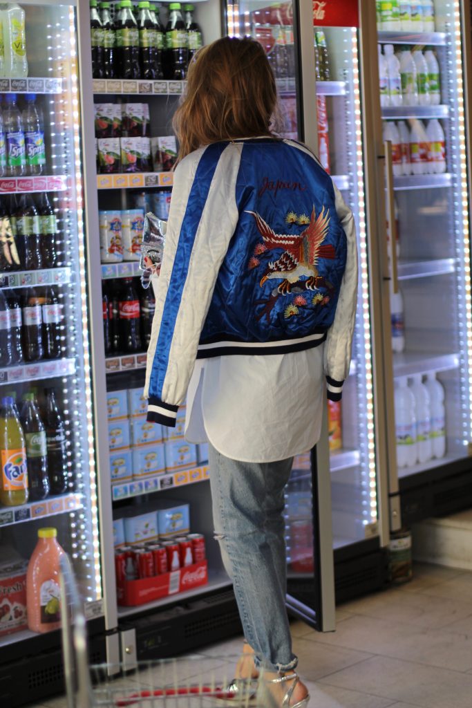 Topshop, Miu Miu, Louis Vuitton, Cutler and Cross, Celine, Levi's, Bernard Delettrez Alexandra Lapp wearing a bomber jacket from Topshop, Miu Miu, Louis Vuitton, Cutler and Cross, Celine, Levi's, Bernard Delettrez