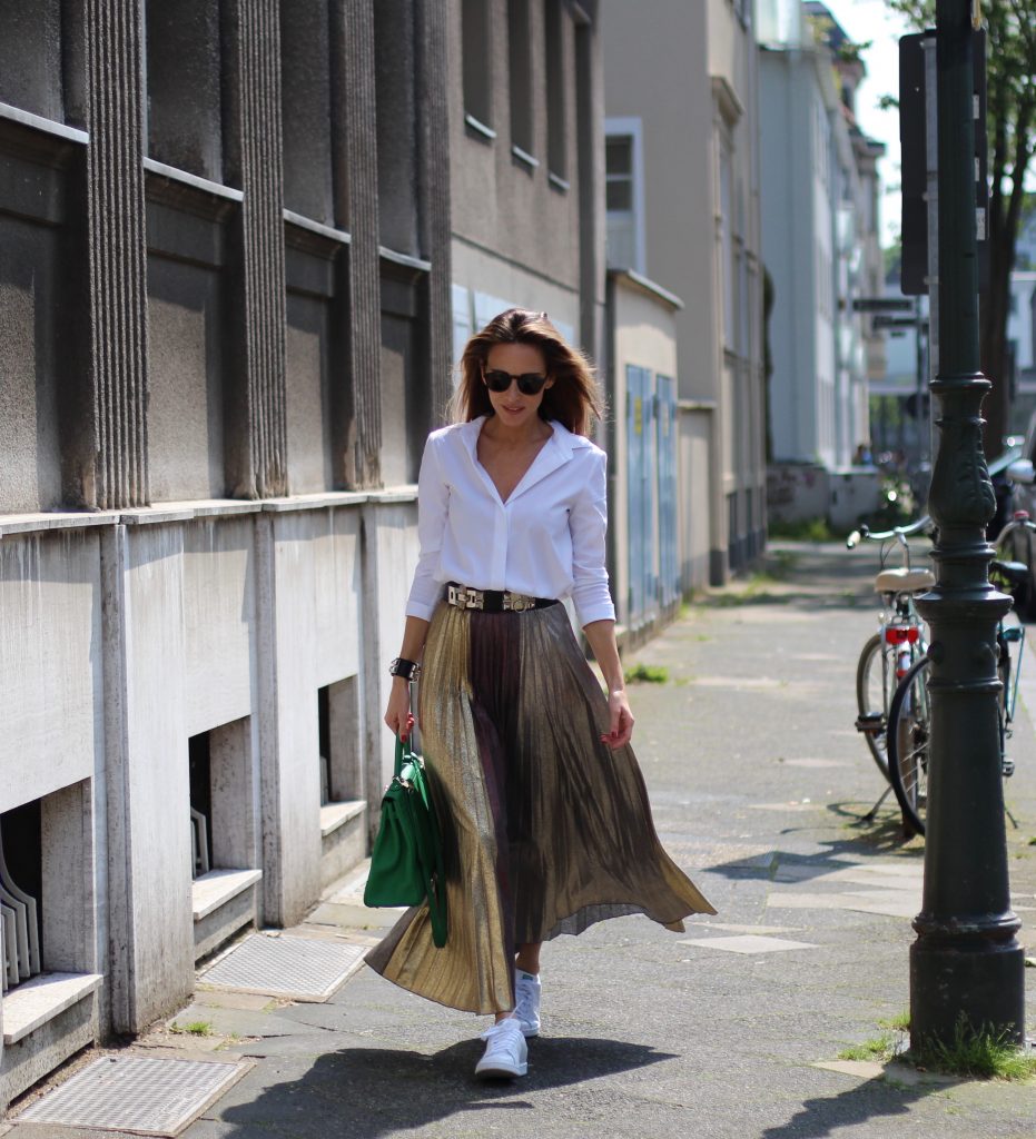 Alexandra Lapp wearing a pleated skirt from Max & Co., Adidas, Steffen Schraut, Hermès, Monokel Eyewear