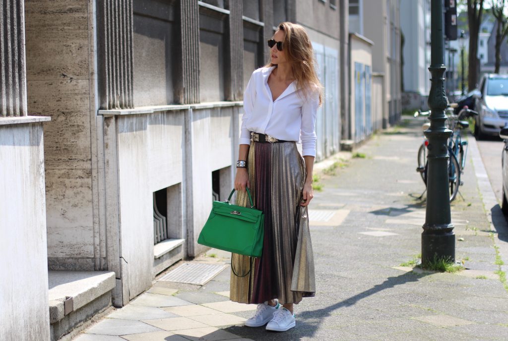 Alexandra Lapp wearing a pleated skirt from Max & Co., Adidas, Steffen Schraut, Hermès, Monokel Eyewear