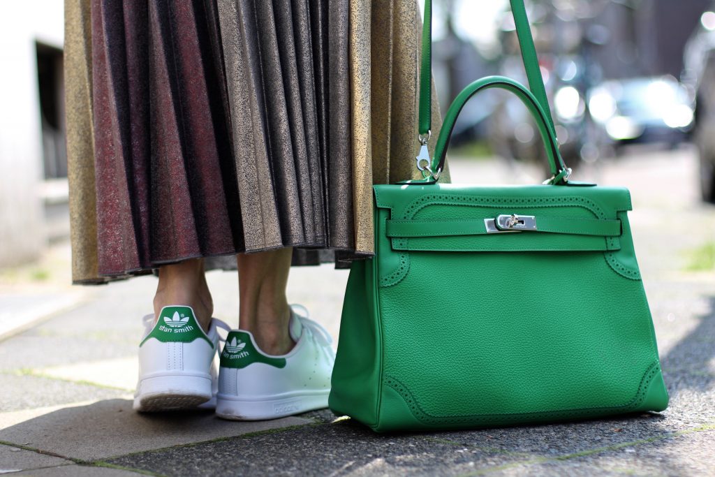 Alexandra Lapp wearing a pleated skirt from Max & Co., Adidas, Steffen Schraut, Hermès, Monokel Eyewear