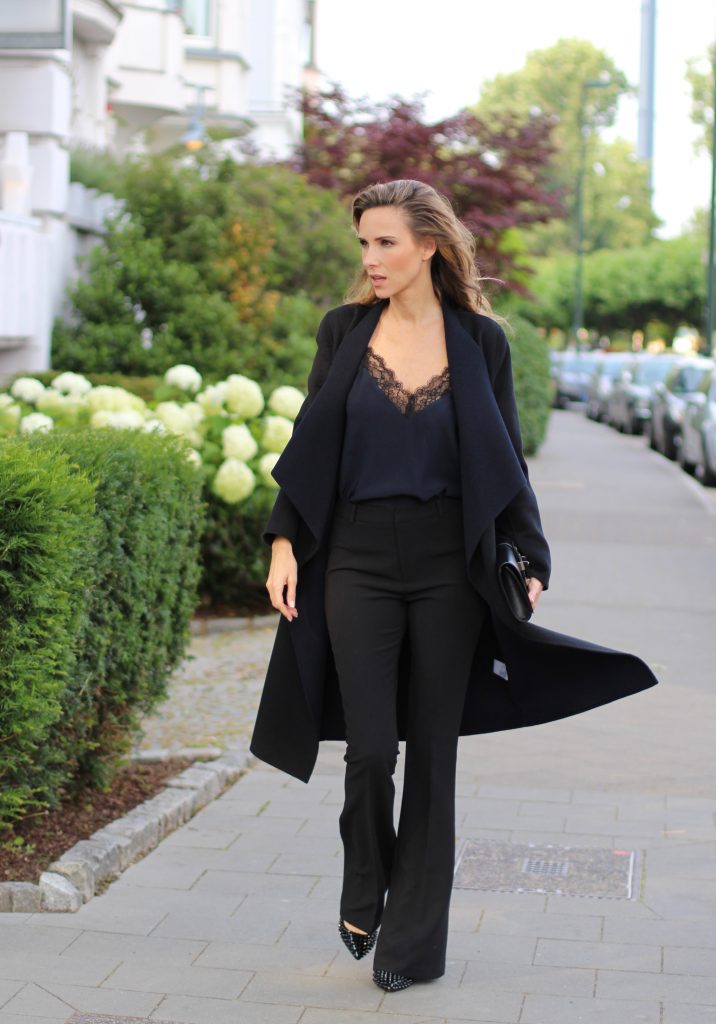 Alexandra Lapp wearing all black, Steffen Schraut, Filippa K., Hermès, Christian Louboutin, IWC
