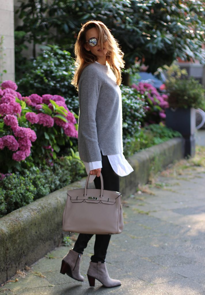 Alexandra Lapp wearing shades of grey, SET leather pants, Steffen Schraut cape and knitwear, Celine oversize shirt, Ash boots, Le Specs sunglasses and Hermès Birkin bag.