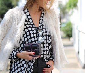 DÜSSELDORF; GERMANY - NOVEMBER : German model and fashion blogger Alexandra Lapp (@alexandralapp_) wearing Polka dots on a blouse from Steffen Schraut, flared leather pants from Tigha, faux fur from Steffen Schraut, Les Specs sunglasses, Gianvito Rossi shoes and Chanel bag on November, 2016 in Germany*** Local Caption *** Alexandra Lapp
