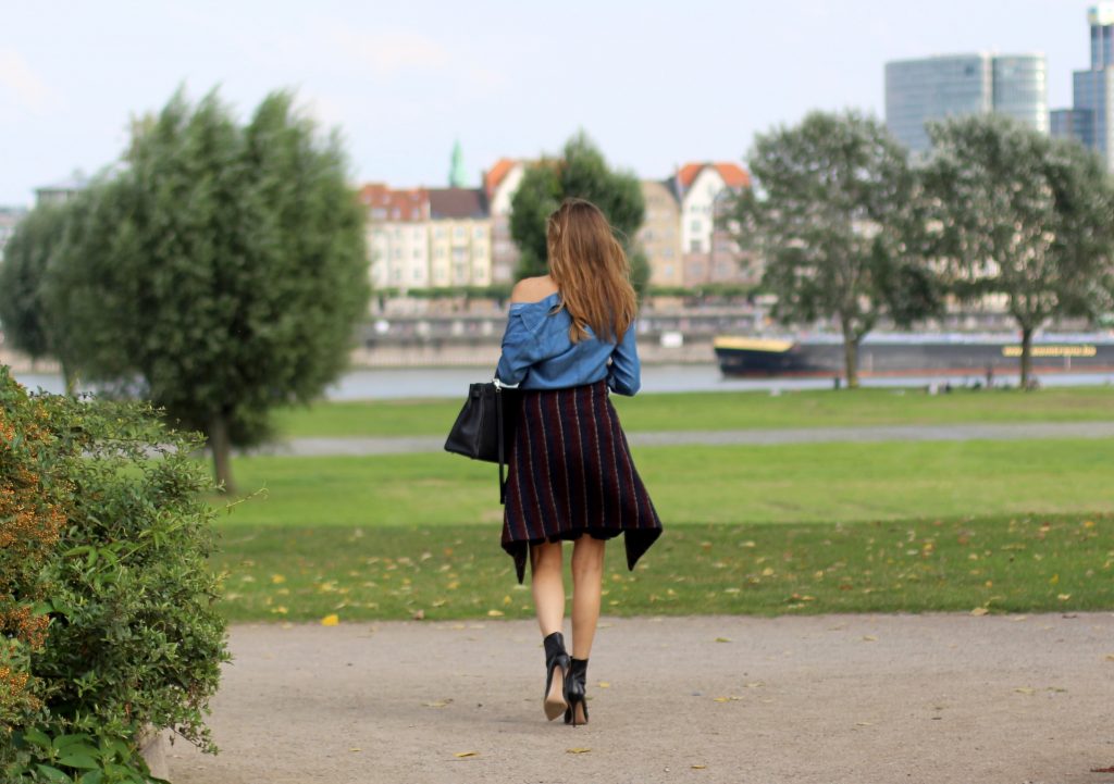 Alexandra Lapp wearing College Set, collage jacket and skirt by SET, Asos denim blouse, Hermès Kelly bag, Ray Ban sunglasses and Gianvito Rossi ankle boots. 