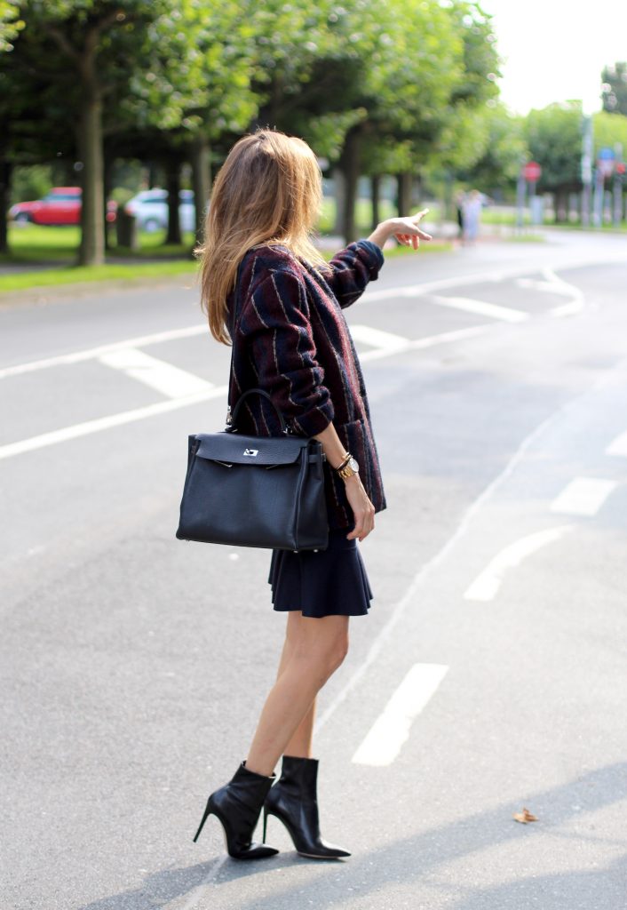 Alexandra Lapp wearing College Set, collage jacket and skirt by SET, Asos denim blouse, Hermès Kelly bag, Ray Ban sunglasses and Gianvito Rossi ankle boots. 
