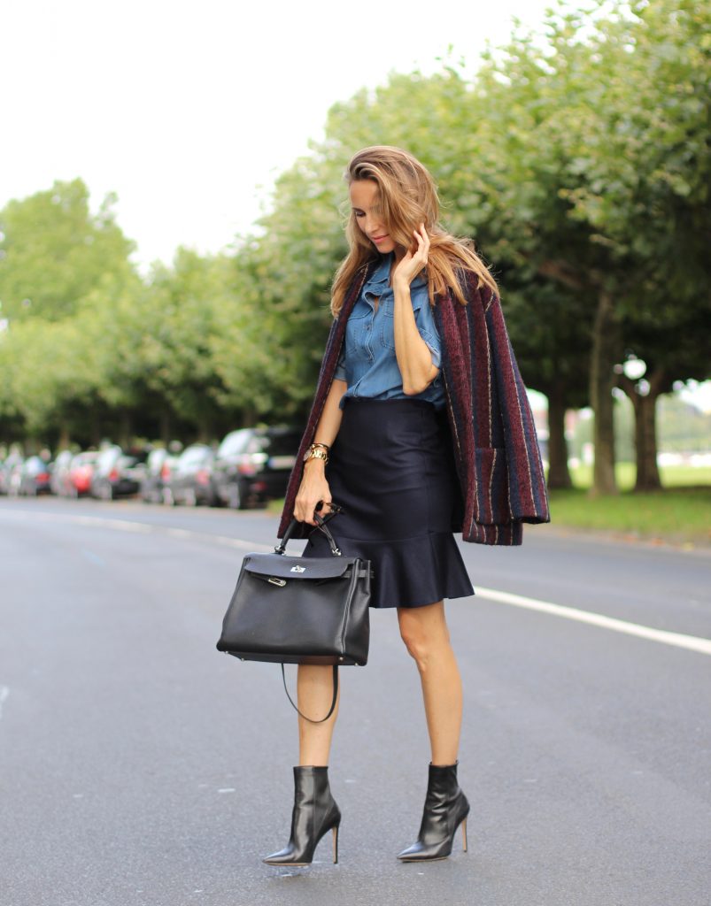 Alexandra Lapp wearing College Set, collage jacket and skirt by SET, Asos denim blouse, Hermès Kelly bag, Ray Ban sunglasses and Gianvito Rossi ankle boots. 