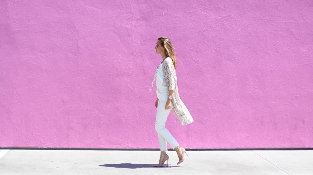 Alexandra Lapp wearing SET, Levi's, Christian Louboutin, Chanel, Chrome Hearts in front of Walls of Los Angeles.