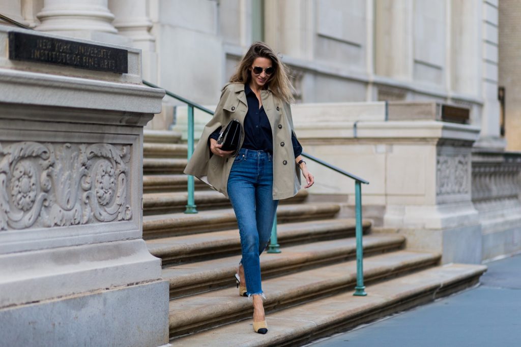 trench cape from SET, Levis denim jeans, Chanel shoes, Gucci bag and Chloe sunglasses NEW YORK, NY - SEPTEMBER 13: German fashion blogger and model Alexandra Lapp (@alexandralapp_) wearing a trench cape from SET, Levis denim jeans, Chanel shoes, Gucci bag and Chloe sunglasses on September 13, 2016 in New York City. (Photo by Christian Vierig/Getty Images) *** Local Caption *** Alexandra Lapp