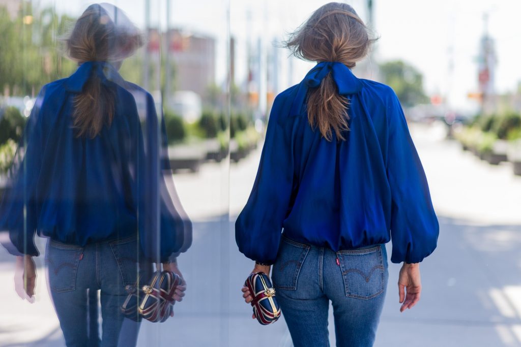 NEW YORK, NY - SEPTEMBER 14: German Fashion Blogger and Model Alexandra Lapp (@alexandralapp_) wearing a back to front shirt from Steffen Schraut, Levis jeans, Alexander Mc Queen clutch on September 14, 2016 in New York City. (Photo by Christian Vierig/Getty Images) *** Local Caption *** Alexandra Lapp