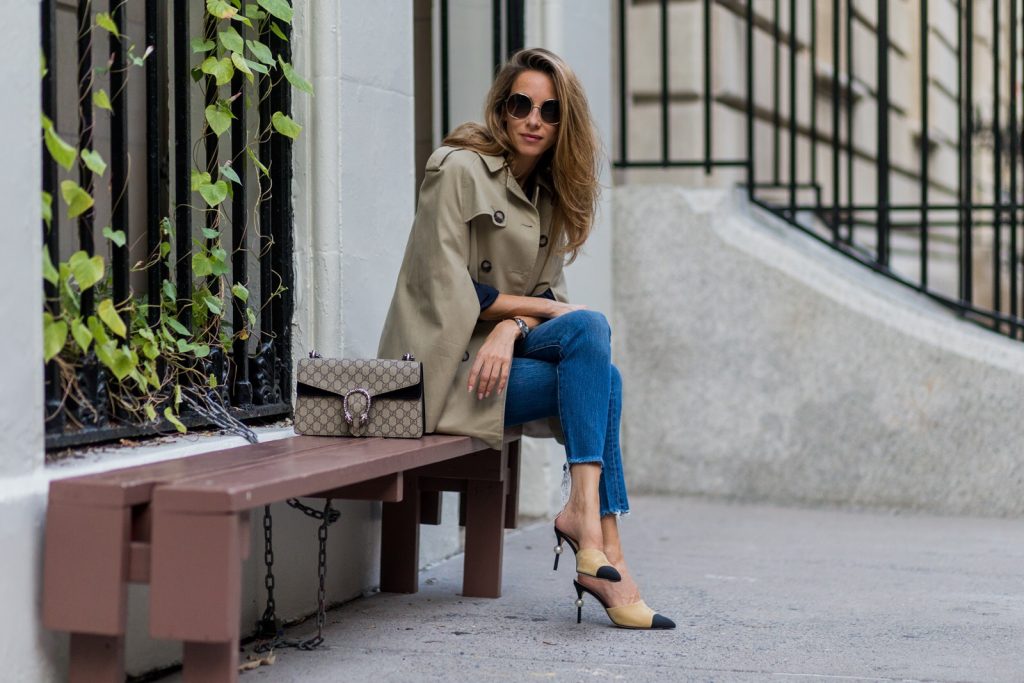 trench cape from SET, Levis denim jeans, Chanel shoes, Gucci bag and Chloe sunglasses NEW YORK, NY - SEPTEMBER 13: German fashion blogger and model Alexandra Lapp (@alexandralapp_) wearing a trench cape from SET, Levis denim jeans, Chanel shoes, Gucci bag and Chloe sunglasses on September 13, 2016 in New York City. (Photo by Christian Vierig/Getty Images) *** Local Caption *** Alexandra Lapp