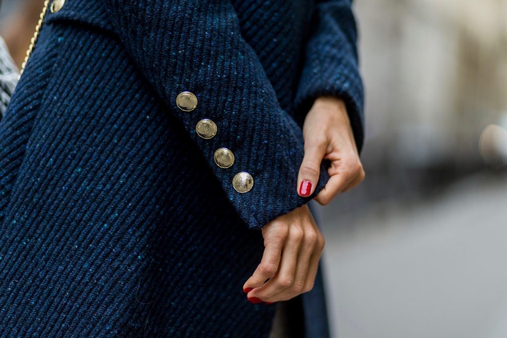 PARIS, FRANCE - SEPTEMBER 30: German fashion blogger and model Alexandra Lapp (@alexandralapp_) wearing Navy Coature, a blouse, grey pants, navy coat and hat from Marc Aurel, strap sandals from Balmain H&M and black Chanel backpack on September 30, 2016 in Paris, France. (Photo by Christian Vierig/Getty Images) *** Local Caption *** Alexandra Lapp