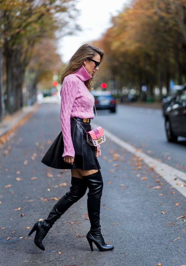 Jil Sander, Steffen Schraut, Celine, Furla, Alaïa, Hermès PARIS, FRANCE - OCTOBER 01: German model and fashion blogger Alexandra Lapp (@alexandralapp_) wearing a pink sweater from Jil Sander, leather pleated skirt from Steffen Schraut, overknees from Alaia, Celine sunglasses, Hermes belt, pink Furla bag on October 1, 2016 in Paris, France. (Photo by Christian Vierig/Getty Images) *** Local Caption *** Alexandra Lapp