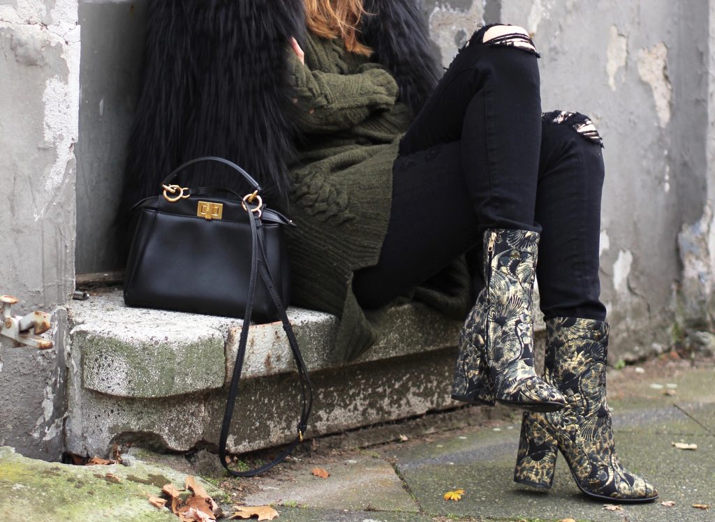 Ash, Prada, Fendi, Celine, Dorfman Pacific, Monokel DÜSSELDORF; GERMANY - DEZEMBER : German model and fashion blogger Alexandra Lapp (@alexandralapp_) wearing brocade booties by Ash, destroyed denim pants from Frame, Celine turtleneck, Prada fur jacket, Dorfman Pacific hat, Monokel eyewear and a Fendi bag on Dezember, 2016 in Germany*** Local Caption *** Alexandra Lapp