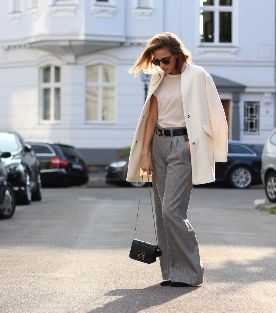 DÜSSELDORF; GERMANY - DEZEMBER : German model and fashion blogger Alexandra Lapp (@alexandralapp_) wearing Oui t-shirt, pants and wide leg pants, Monokel Eyewear sunglasses, Hermès belt, Tabitha Simmons shoes and Furla bag on Dezember, 2016 in Germany*** Local Caption *** Alexandra Lapp