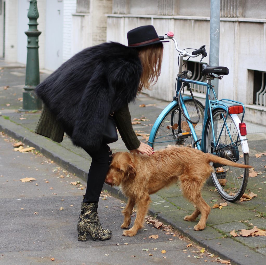 Ash, Prada, Fendi, Celine, Dorfman Pacific, Monokel DÜSSELDORF; GERMANY - DEZEMBER : German model and fashion blogger Alexandra Lapp (@alexandralapp_) wearing brocade booties by Ash, destroyed denim pants from Frame, Celine turtleneck, Prada fur jacket, Dorfman Pacific hat, Monokel eyewear and a Fendi bag on Dezember, 2016 in Germany*** Local Caption *** Alexandra Lapp