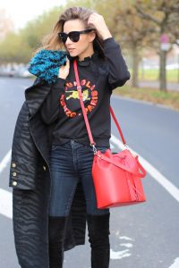 DÜSSELDORF; GERMANY - DEZEMBER : German model and fashion blogger Alexandra Lapp (@alexandralapp_) wearing Kenzo x H&M sweater and coat Céline sunglasses, Gianvito Rossi overknees and Camelia Roma bag on Dezember, 2016 in Germany*** Local Caption *** Alexandra Lapp