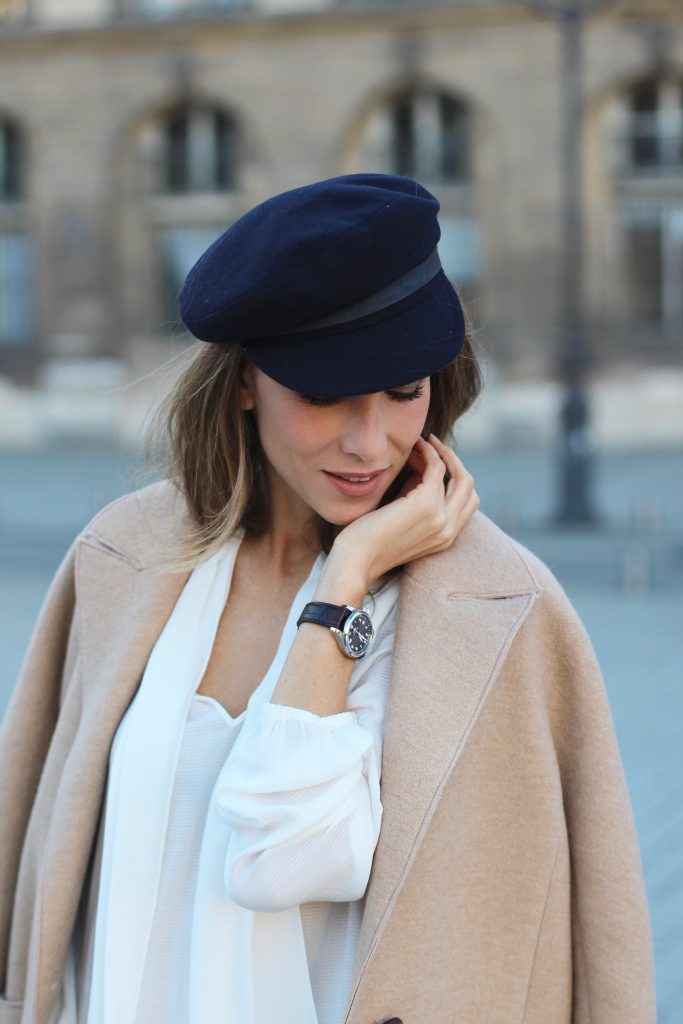 Place Vendôme, PARIS, FRANCE - NOVEMBER : German model and fashion blogger Alexandra Lapp (@alexandralapp_) wearing a camel coat, tie neck blouse and pants by Marc Aurel, princetown slippers from Gucci and peekaboo mini bag from Fendi, on November 2016 in Paris, France. *** Local Caption *** Alexandra Lapp