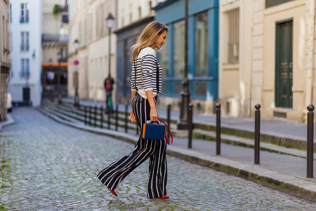 Steffen Schraut, Emilio Pucci, H&M, Gianvito Rossi, Mark Cross PARIS, FRANCE - OCTOBER 01: German model and fashion blogger Alexandra Lapp (@alexandralapp_) wearing striped jumper from Steffen Schraut, striped pants from Emilio Pucci, suspenders H&M, Gianvito Rossi shoes and Mark Cross bag on October 1, 2016 in Paris, France. (Photo by Christian Vierig/Getty Images) *** Local Caption *** Alexandra Lapp