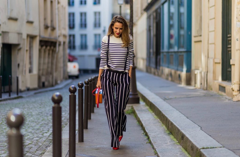 Steffen Schraut, Emilio Pucci, H&M, Gianvito Rossi, Mark Cross PARIS, FRANCE - OCTOBER 01: German model and fashion blogger Alexandra Lapp (@alexandralapp_) wearing striped jumper from Steffen Schraut, striped pants from Emilio Pucci, suspenders H&M, Gianvito Rossi shoes and Mark Cross bag on October 1, 2016 in Paris, France. (Photo by Christian Vierig/Getty Images) *** Local Caption *** Alexandra Lapp