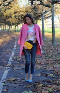 DÜSSELDORF; GERMANY - DEZEMBER : German model and fashion blogger Alexandra Lapp (@alexandralapp_) wearing a Coco Cuba T-shirt from Chanel, high waist denim from Levi's, cashmere coat from Prada, rockstud pumps by Gianvito Rossi and a yellow GG Marmont Mini bag by Gucci on Dezember, 2016 in Germany*** Local Caption *** Alexandra Lapp