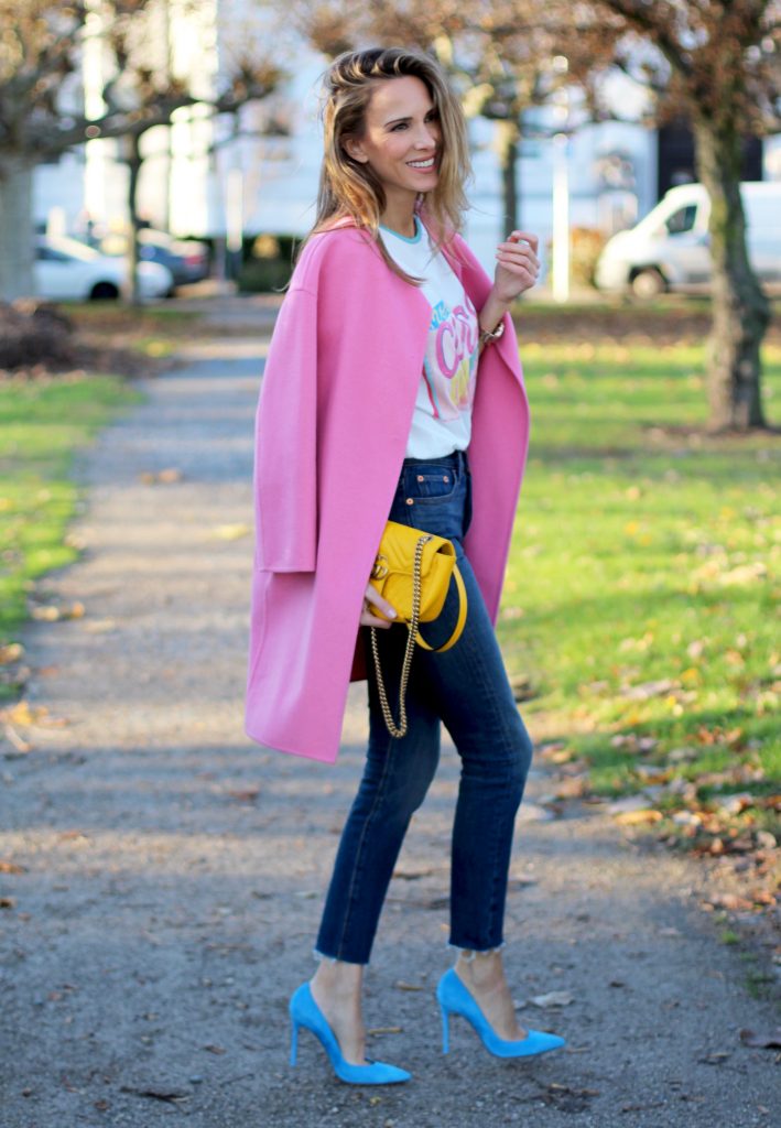 DÜSSELDORF; GERMANY - DEZEMBER : German model and fashion blogger Alexandra Lapp (@alexandralapp_) wearing a Coco Cuba T-shirt from Chanel, high waist denim from Levi's, cashmere coat from Prada, rockstud pumps by Gianvito Rossi and a yellow GG Marmont Mini bag by Gucci on Dezember, 2016 in Germany*** Local Caption *** Alexandra Lapp