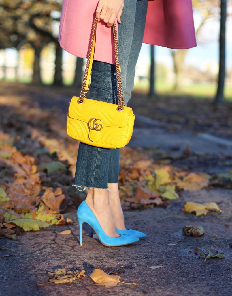 DÜSSELDORF; GERMANY - DEZEMBER : German model and fashion blogger Alexandra Lapp (@alexandralapp_) wearing a Coco Cuba T-shirt from Chanel, high waist denim from Levi's, cashmere coat from Prada, rockstud pumps by Gianvito Rossi and a yellow GG Marmont Mini bag by Gucci on Dezember, 2016 in Germany*** Local Caption *** Alexandra Lapp