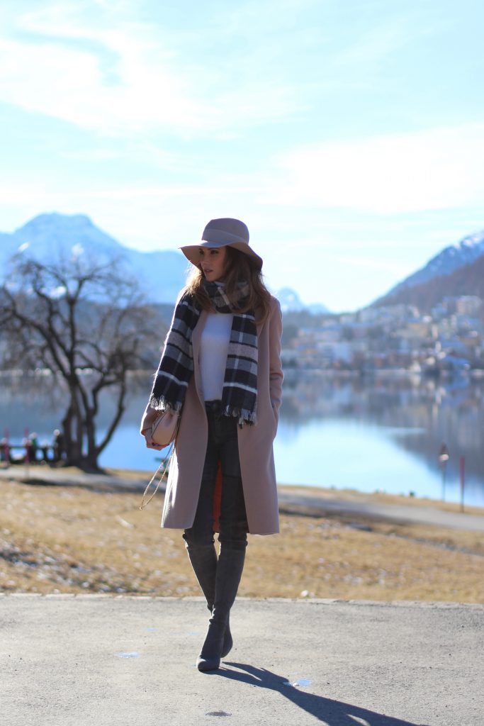 Sankt Moritz, Marc Cain, Gianvito Rossi, Chloé, IWC SANKT MORITZ - DEZEMBER : German model and fashion blogger Alexandra Lapp (@alexandralapp_) wearing Marc Cain in St. Moritz, an off white turtleneck, grey slim jeans, a beige cashmere coat, scarf and hat by Marc Cain, overknee boots in grey from Gianvito Rossi, IWC watch and a bag by Chloe on Dezember, 2016 in Sankt Moritz *** Local Caption *** Alexandra Lapp