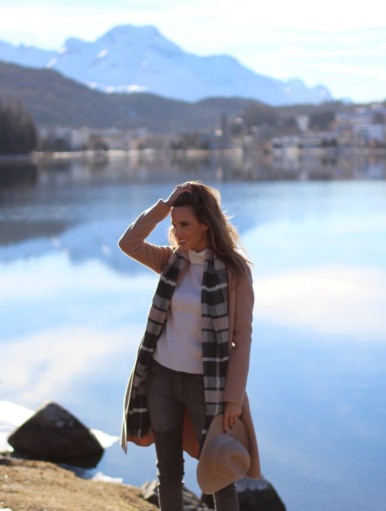 Sankt Moritz, Marc Cain, Gianvito Rossi, Chloé, IWC SANKT MORITZ - DEZEMBER : German model and fashion blogger Alexandra Lapp (@alexandralapp_) wearing Marc Cain in St. Moritz, an off white turtleneck, grey slim jeans, a beige cashmere coat, scarf and hat by Marc Cain, overknee boots in grey from Gianvito Rossi, IWC watch and a bag by Chloe on Dezember, 2016 in Sankt Moritz *** Local Caption *** Alexandra Lapp