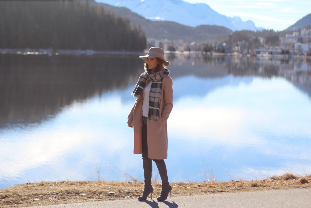 Sankt Moritz, Marc Cain, Gianvito Rossi, Chloé, IWC SANKT MORITZ - DEZEMBER : German model and fashion blogger Alexandra Lapp (@alexandralapp_) wearing Marc Cain in St. Moritz, an off white turtleneck, grey slim jeans, a beige cashmere coat, scarf and hat by Marc Cain, overknee boots in grey from Gianvito Rossi, IWC watch and a bag by Chloe on Dezember, 2016 in Sankt Moritz *** Local Caption *** Alexandra Lapp