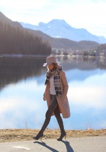 SANKT MORITZ - DEZEMBER : German model and fashion blogger Alexandra Lapp (@alexandralapp_) wearing Marc Cain in St. Moritz, an off white turtleneck, grey slim jeans, a beige cashmere coat, scarf and hat by Marc Cain, overknee boots in grey from Gianvito Rossi, IWC watch and a bag by Chloe on Dezember, 2016 in Sankt Moritz *** Local Caption *** Alexandra Lapp