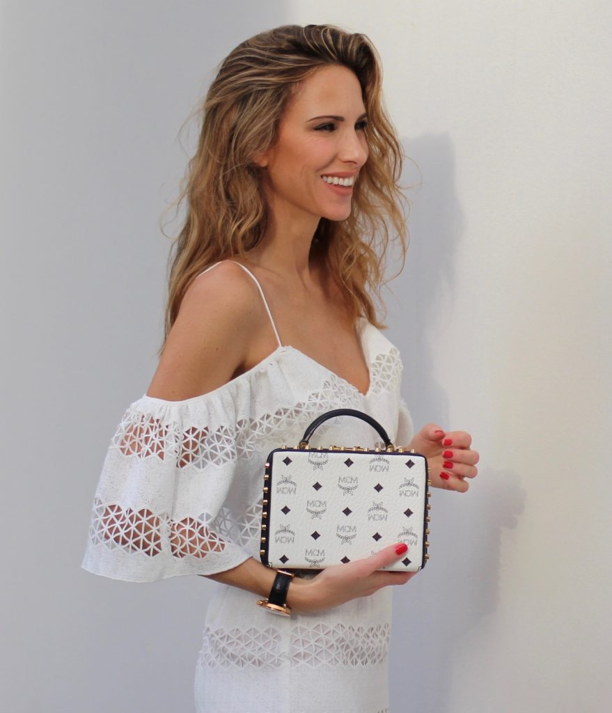 MIAMI; FLORIDA - JANUARY : German model and fashion blogger Alexandra Lapp (@alexandralapp_) wearing a MCM Berlin crossbody bag in black and white, Isla off the shoulder dress in white, Saint Laurent pumps, an IWC watch and cat eye sunglasses by Prada on January, 2017 in Miami *** Local Caption *** Alexandra Lapp