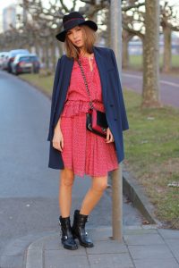 DÜSSELDORF, GERMANY - FEBRUARY 19: German fashion blogger and model Alexandra Lapp is wearing a flounce dress in red from Steffen Schraut, a midnight blue blazer by Steffen Schraut, Maison Michel Virginie rabbit-felt fedora hat in black with a grosgrain ribbon in dark blue with red, that is adorned with the label's logo in the form of a glossy black charm, a boy bag in black and red calfskin and vintage biker boots by Gucci on February 19, 2017 Düsseldorf, Germany. *** Local Caption *** Alexandra Lapp