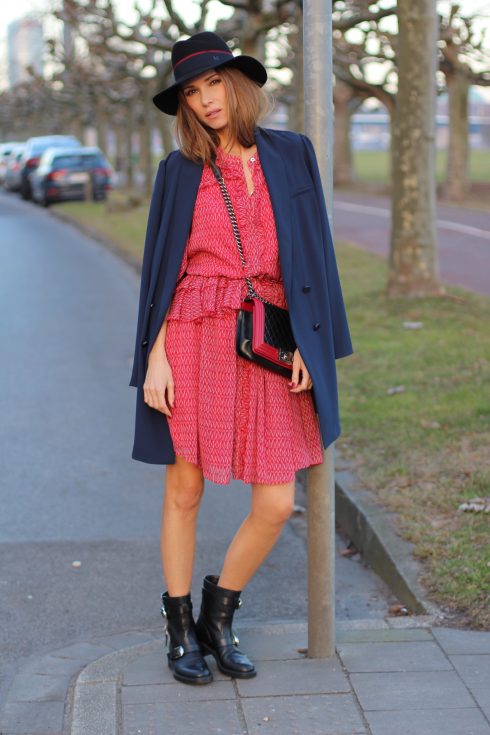 DÜSSELDORF, GERMANY - FEBRUARY 19: German fashion blogger and model Alexandra Lapp is wearing a flounce dress in red from Steffen Schraut, a midnight blue blazer by Steffen Schraut, Maison Michel Virginie rabbit-felt fedora hat in black with a grosgrain ribbon in dark blue with red, that is adorned with the label's logo in the form of a glossy black charm, a boy bag in black and red calfskin and vintage biker boots by Gucci on February 19, 2017 Düsseldorf, Germany. *** Local Caption *** Alexandra Lapp