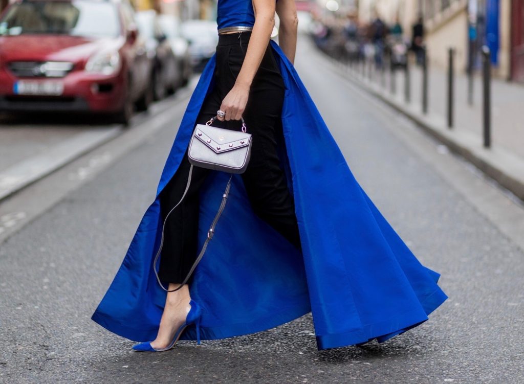 asymmetric one-shoulder silhouette, MCM, Pearl & Rubies, Cartier, Gianvito Rossi, Paris, France, PFW PARIS; FRANCE; Model and Blogger Alexandra Lapp wearing asymmetric one shoulder silhouette, blue taffeta and leather top from Pearl and Rubies with a skin barring asymmetric one-shoulder Silhouette, Black pants from Pearl and Rubies, Blue suede plexi pumps from Gianvito Rossi, Catherine shoulder mini bag in silver from MCM on March 4, 2017 in Paris, France.