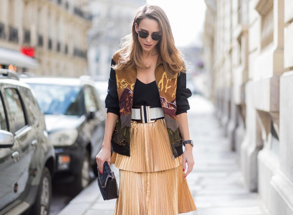 Paris, France, PFW, pleated skirt, bomber jacket, Stella McCartney, Jadicted, RayBan, Prada, IWC, Balmain PARIS;FRANCE during PFW, Model and Blogger Alexandra Lapp wearing a pleated skirt & bomber jacket from Stella McCartney, skirt named Melody skirt, Stella McCartney blue Falabella box mini shoulder bag, black silk Tank top from Jadicted, white lacquer pumps by Prada, RayBan clubmaster sunglasses, waist belt in black and white by Balmain on March 3, 2017 in Paris, France.