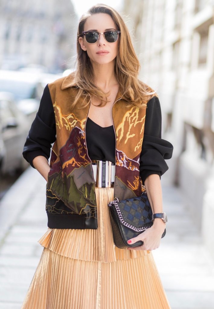 Paris, France, PFW, pleated skirt, bomber jacket, Stella McCartney, Jadicted, RayBan, Prada, IWC, Balmain PARIS;FRANCE during PFW, Model and Blogger Alexandra Lapp wearing a pleated skirt & bomber jacket from Stella McCartney, skirt named Melody skirt, Stella McCartney blue Falabella box mini shoulder bag, black silk Tank top from Jadicted, white lacquer pumps by Prada, RayBan clubmaster sunglasses, waist belt in black and white by Balmain on March 3, 2017 in Paris, France.