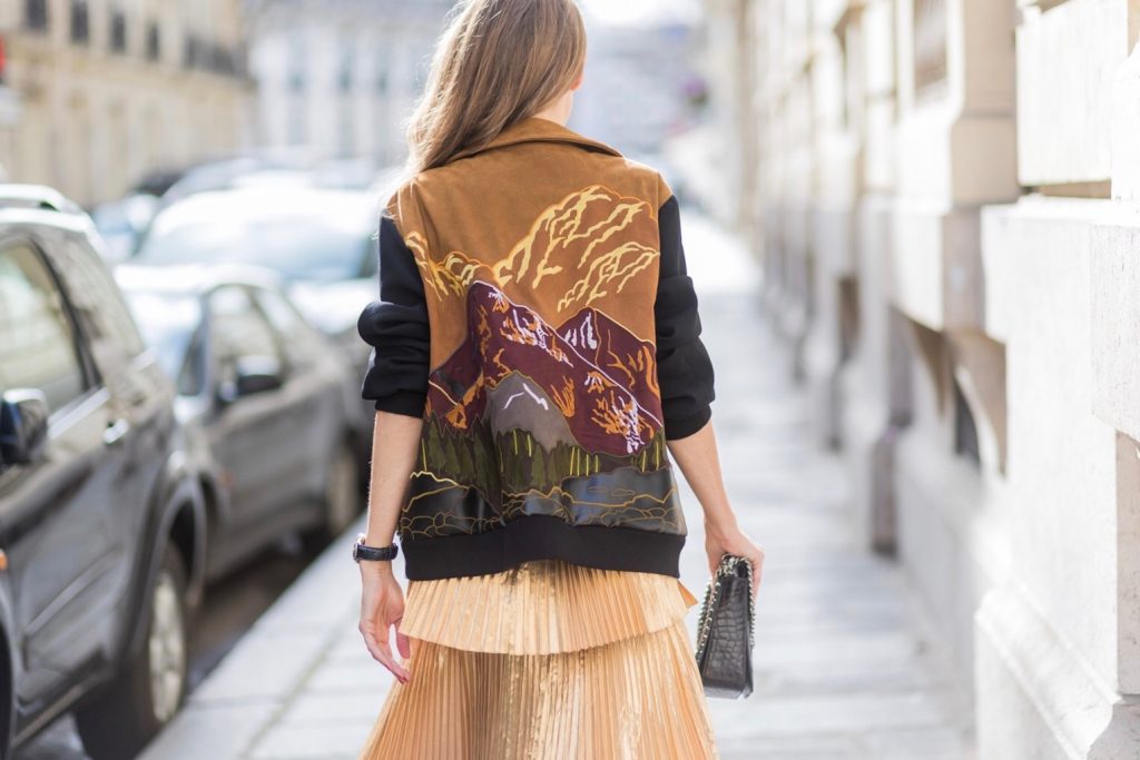 Paris, France, PFW, pleated skirt, bomber jacket, Stella McCartney, Jadicted, RayBan, Prada, IWC, Balmain PARIS;FRANCE during PFW, Model and Blogger Alexandra Lapp wearing a pleated skirt & bomber jacket from Stella McCartney, skirt named Melody skirt, Stella McCartney blue Falabella box mini shoulder bag, black silk Tank top from Jadicted, white lacquer pumps by Prada, RayBan clubmaster sunglasses, waist belt in black and white by Balmain on March 3, 2017 in Paris, France.