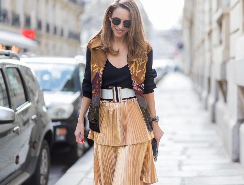 Paris, France, PFW, pleated skirt, bomber jacket, Stella McCartney, Jadicted, RayBan, Prada, IWC, Balmain PARIS;FRANCE during PFW, Model and Blogger Alexandra Lapp wearing a pleated skirt & bomber jacket from Stella McCartney, skirt named Melody skirt, Stella McCartney blue Falabella box mini shoulder bag, black silk Tank top from Jadicted, white lacquer pumps by Prada, RayBan clubmaster sunglasses, waist belt in black and white by Balmain on March 3, 2017 in Paris, France.
