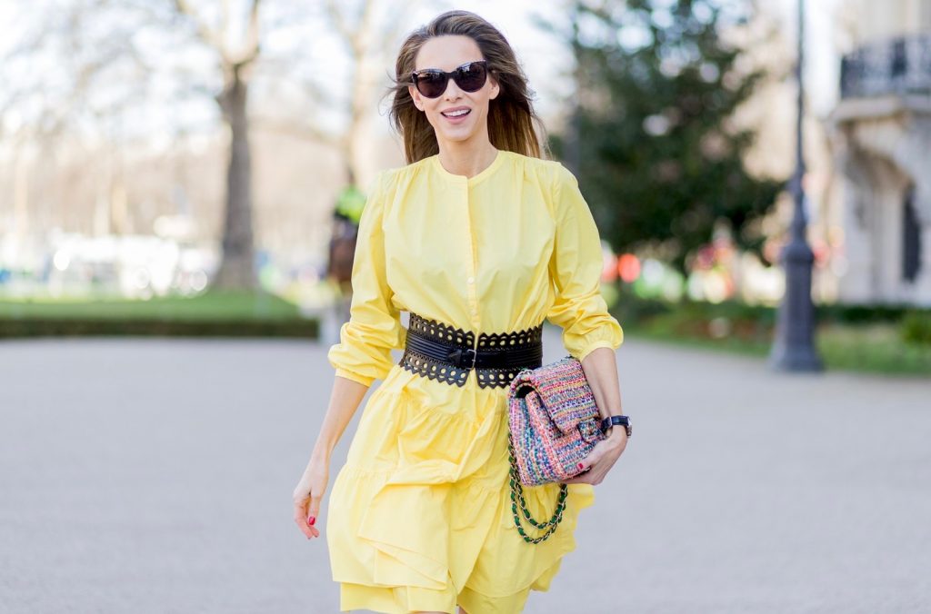 yellow sunshine dress, Marc Cain, Alaïa, Sophia Webster, Chanel, IWC PARIS, FRANCE - MARCH 03: Alexandra Lapp wearing a yellow sunshine dress by Marc Cain, loose-fitting dress with flounce-like tiers, narrow, single-buttoned,(waist belt) Azzedine Alaia, Chiara Butterfly style sandals from Sophia Webster ( printed Butterfly Wing sandal, finished with a silver mirror front strap), cat eye sunglasses with pearls from Chanel, Chanel bag on March 3, 2017 in Paris, France. (Photo by Christian Vierig/Getty Images)