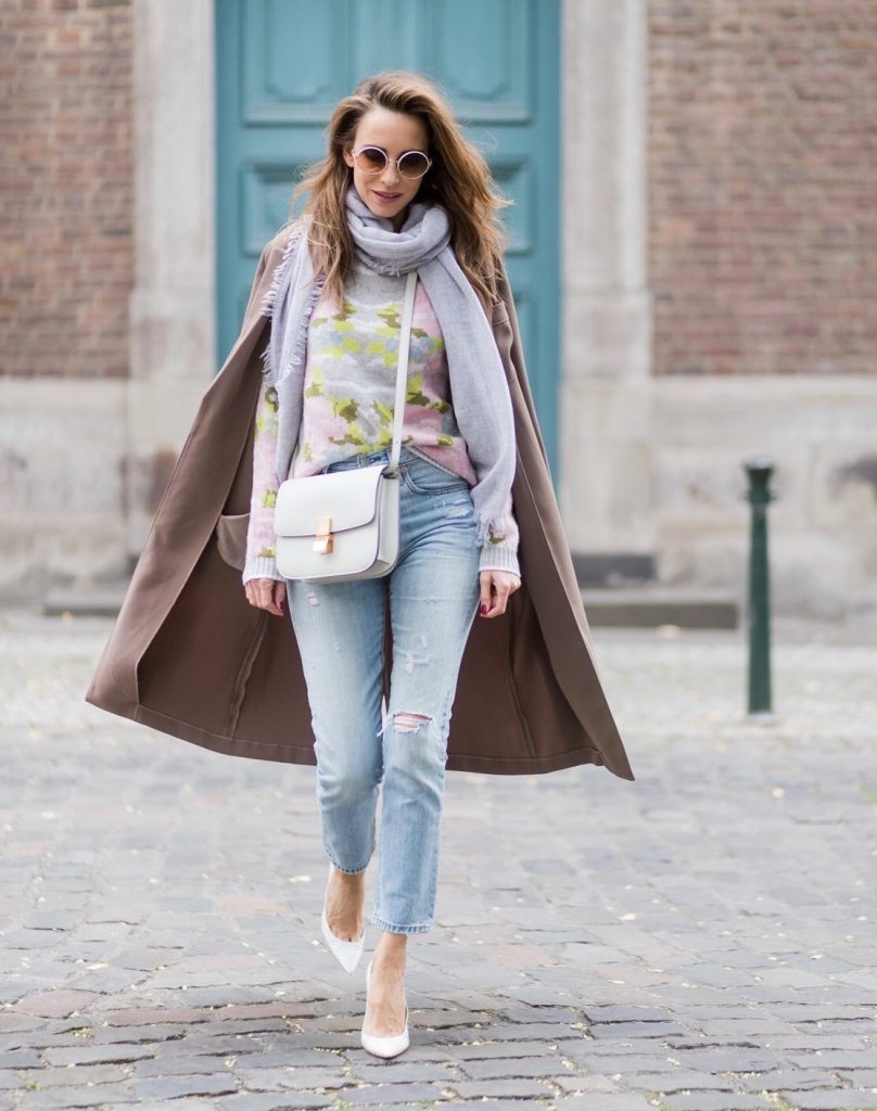 Cashmere love for Model and fashion blogger Alexandra Lapp, who is wearing colorful cashmere pullover by Heartbreaker, high waist five-pocket 501 skinny jeans from Levis, cashmere scarf in grey by Heartbreaker, white snake pumps from Christian Louboutin, round sunglasses in white from Chrome Hearts, Celine Box bag in light grey and a big statement ring in rose gold with baguette diamonds by Schubart Goldschmiede on August 5, 2017 in Duesseldorf, Germany.