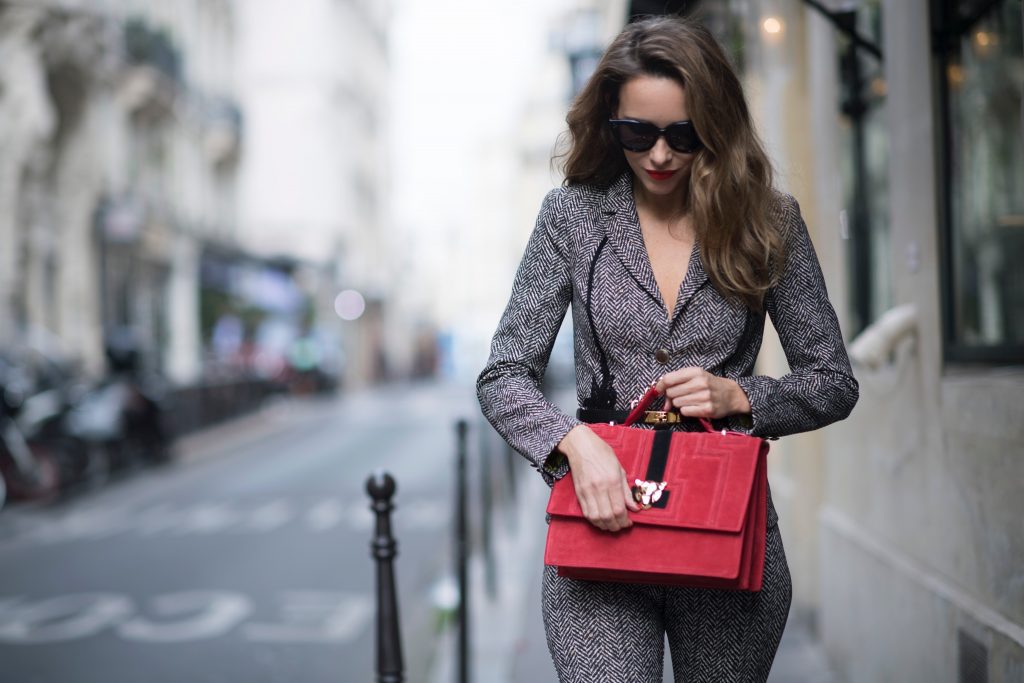 Marc Cain, Stirrup Pants, Celine, Hermes, Christian Louboutin, Paris, PFW, PFW17 Alexandra Lapp seen wearing stirrup pants and blazer in checkered pattern, glencheck and a red bag by Marc Cain, So Kate pumps from Christian Louboutin, Celine Audrey sunglasses and a waist belt by Hermes in the streets of Paris on September 27, 2017 in Paris, France.