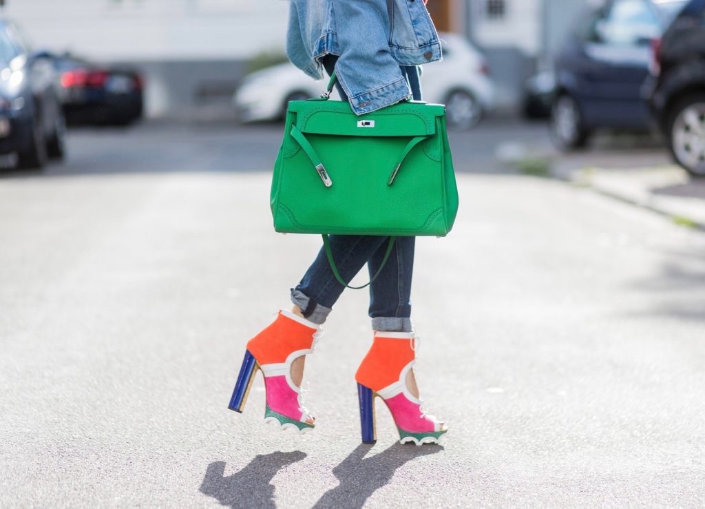 Color Blocking, Christian Louboutin, Heartbreaker, AG Jeans, SET, Hermès, Gucci Model and fashion blogger Alexandra Lapp wearing color blocking, oversized denim jacket by SET, high waist denim from Rag and Bone Jeans, red cashmere hoodie with pink flowers by Heartbreaker, green Kelly bag by Hermes, Lolacramp color blocking heels from Christian Louboutin and Gucci sunglasses on August 5, 2017 in Duesseldorf, Germany.