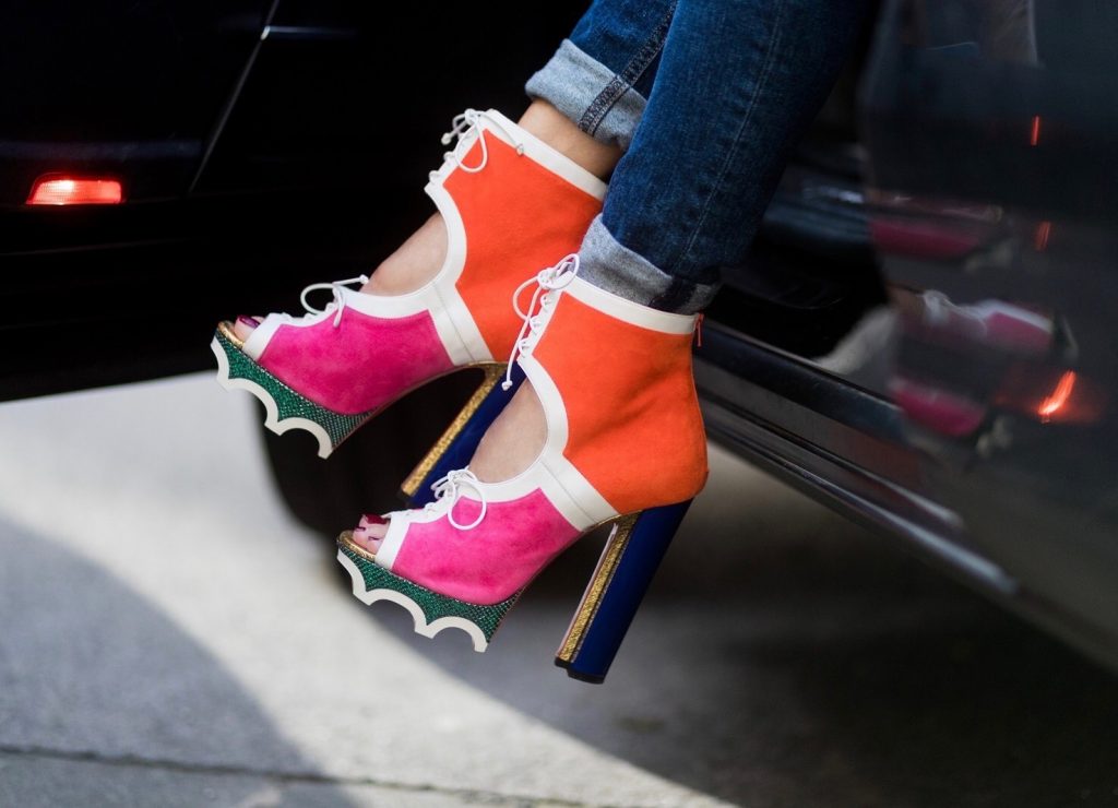 Color Blocking, Christian Louboutin, Heartbreaker, AG Jeans, SET, Hermès, Gucci Model and fashion blogger Alexandra Lapp wearing color blocking, oversized denim jacket by SET, high waist denim from Rag and Bone Jeans, red cashmere hoodie with pink flowers by Heartbreaker, green Kelly bag by Hermes, Lolacramp color blocking heels from Christian Louboutin and Gucci sunglasses on August 5, 2017 in Duesseldorf, Germany.