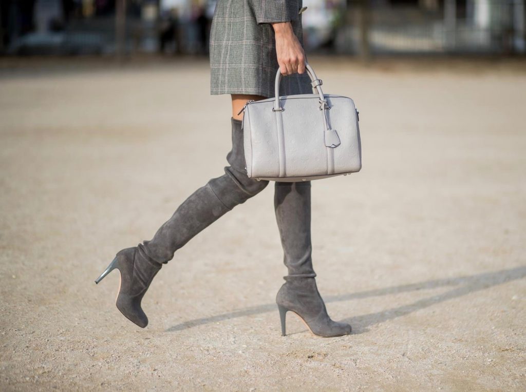Alexandra Lapp wearing plaid blazer dress with a waist belt from Zara, the Essential Boston Bag with Monogramm in grey by MCM, silver mirrored sunglasses from le Specs, grey suede overknee boots by Gianvito Rossi is seen during Paris Fashion Week Spring/Summer 2018 on September 28, 2017 in Paris, France.