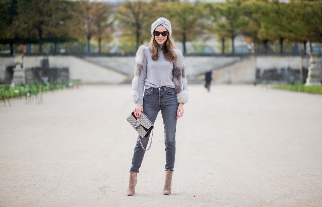 Alexandra Lapp wearing turban style in Paris, a cashmere turban from Falconeri, cashmere turtleneck pullover with fur sleeves from Falconeri, Levis 501 Skinny Fit jeans in black, sunglasses with pearls from Chanel, beige suede ankle boots by Gianvito Rossi and Dionysus GG Supreme shoulder bag from Gucci is seen during Paris Fashion Week Spring/Summer 2018 on September 29, 2017 in Paris, France.