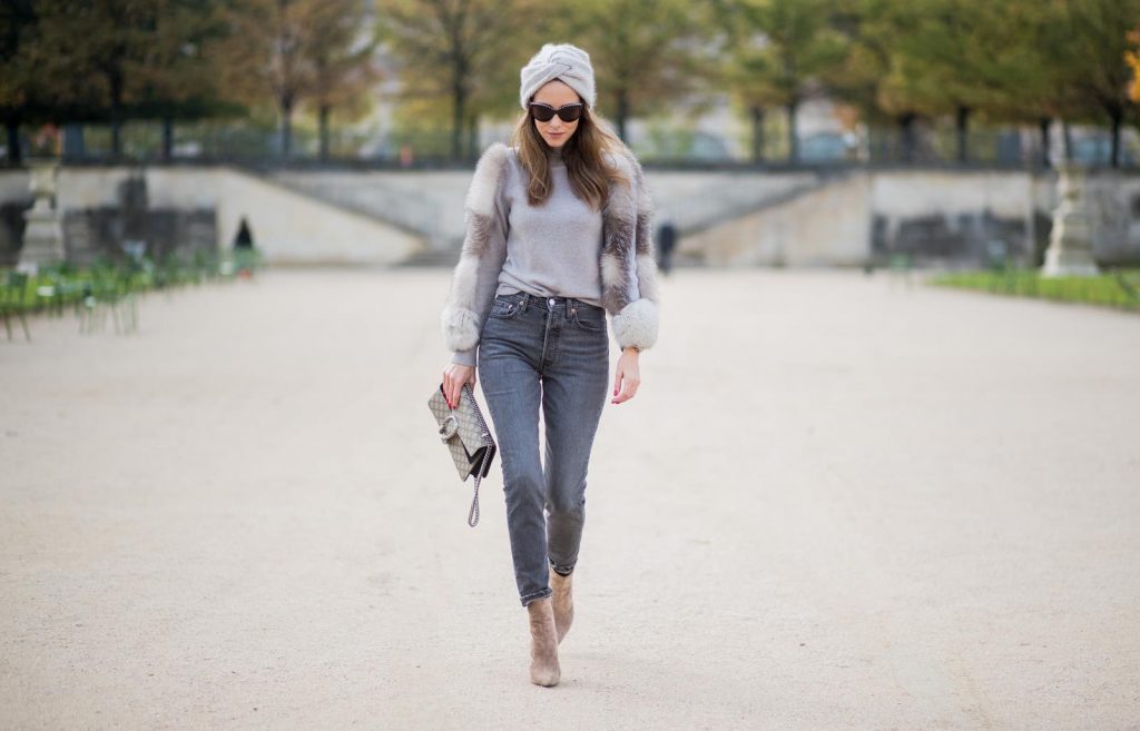 Alexandra Lapp wearing turban style in Paris, a cashmere turban from Falconeri, cashmere turtleneck pullover with fur sleeves from Falconeri, Levis 501 Skinny Fit jeans in black, sunglasses with pearls from Chanel, beige suede ankle boots by Gianvito Rossi and Dionysus GG Supreme shoulder bag from Gucci is seen during Paris Fashion Week Spring/Summer 2018 on September 29, 2017 in Paris, France.