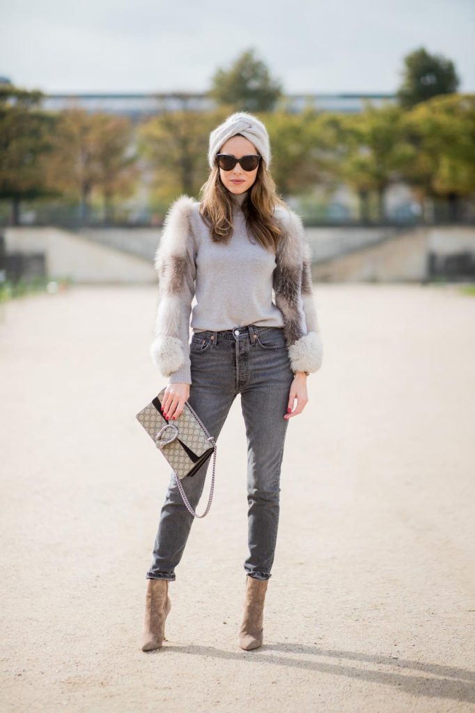 Alexandra Lapp wearing turban style in Paris, a cashmere turban from Falconeri, cashmere turtleneck pullover with fur sleeves from Falconeri, Levis 501 Skinny Fit jeans in black, sunglasses with pearls from Chanel, beige suede ankle boots by Gianvito Rossi and Dionysus GG Supreme shoulder bag from Gucci is seen during Paris Fashion Week Spring/Summer 2018 on September 29, 2017 in Paris, France.