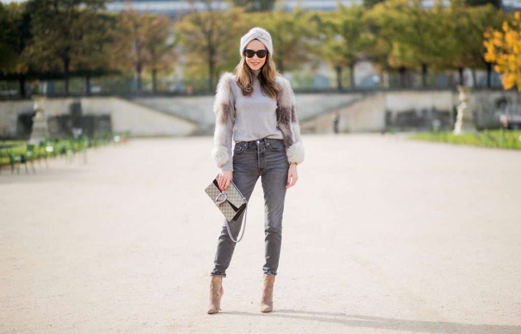 Alexandra Lapp wearing turban style in Paris, a cashmere turban from Falconeri, cashmere turtleneck pullover with fur sleeves from Falconeri, Levis 501 Skinny Fit jeans in black, sunglasses with pearls from Chanel, beige suede ankle boots by Gianvito Rossi and Dionysus GG Supreme shoulder bag from Gucci is seen during Paris Fashion Week Spring/Summer 2018 on September 29, 2017 in Paris, France.